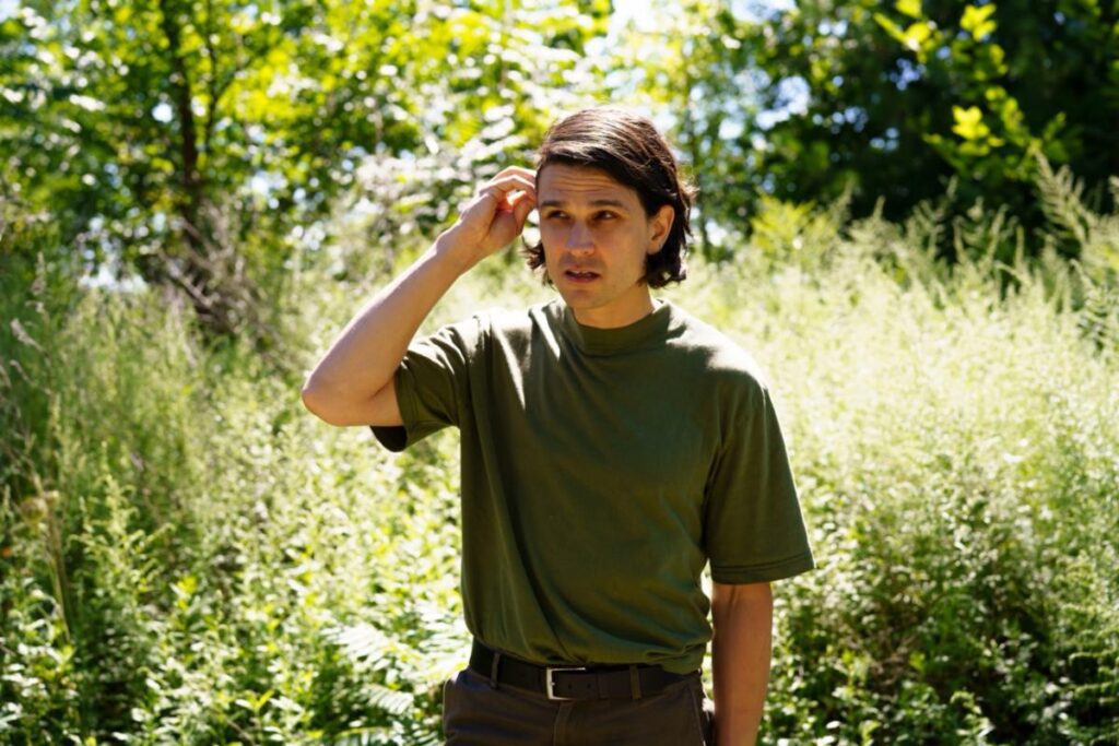 Photo of Jo Hirabayashi of Jo Passed by Justine Nelson, showing the Toronto-based musician in a candid, atmospheric portrait that reflects the personal and introspective mood of the upcoming album Away.